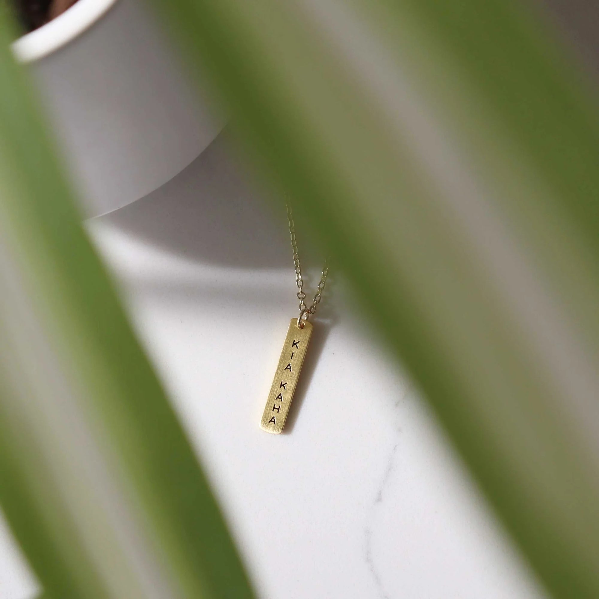 Te Reo Kia Kaha Necklace Gold